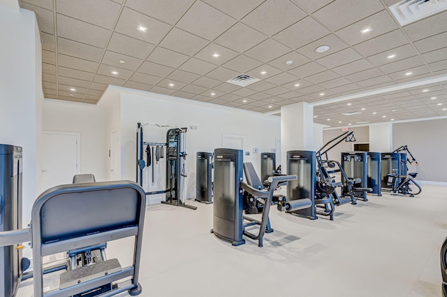 exercise room featuring ornamental molding