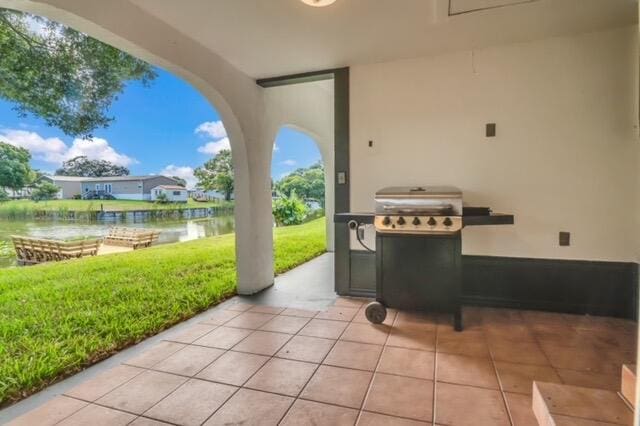 view of patio / terrace featuring a water view