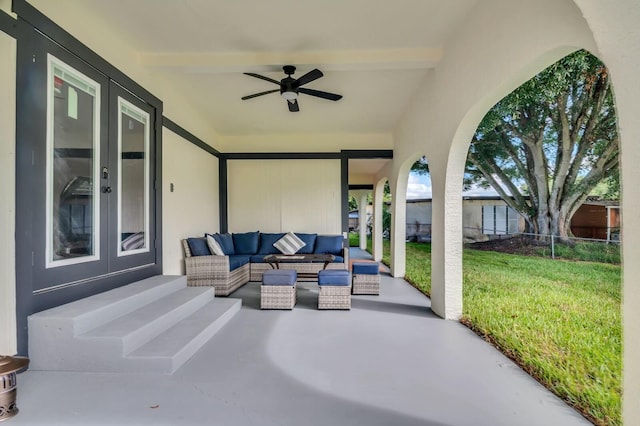 view of patio featuring ceiling fan and an outdoor living space