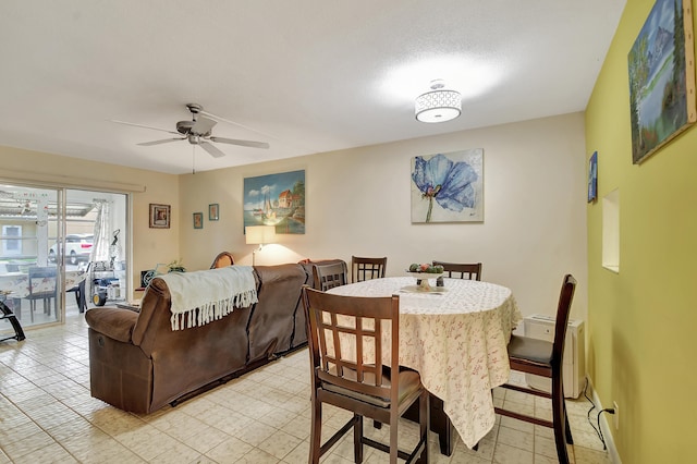 dining space with ceiling fan