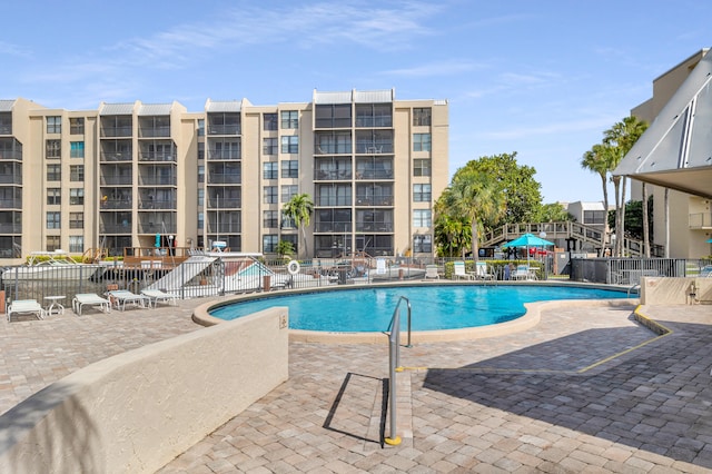 view of pool featuring a patio