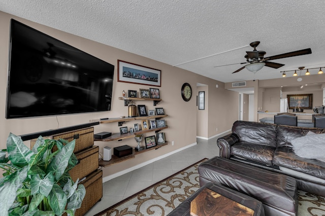 9 Royal Palm Way Unit 4020, Boca Raton, FL 33432 - tiled living room featuring a textured ceiling, a ceiling fan, and baseboards
