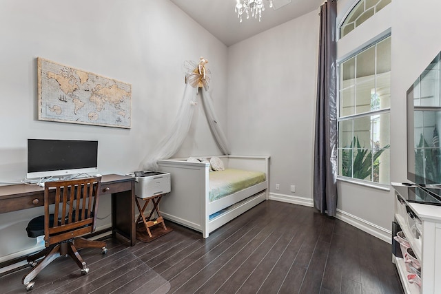 bedroom with dark hardwood / wood-style flooring and vaulted ceiling