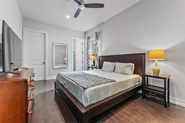 bedroom featuring ceiling fan and dark hardwood / wood-style floors