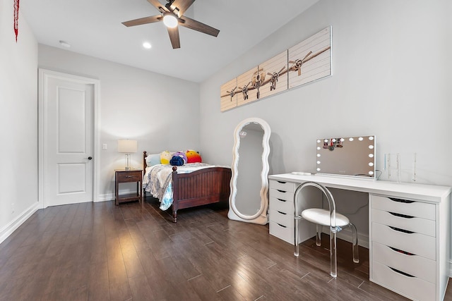 bedroom with ceiling fan and dark wood-type flooring