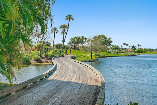 view of community with a water view