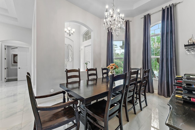 dining space with a chandelier