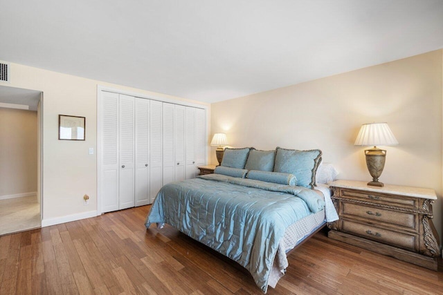 bedroom featuring a closet and hardwood / wood-style floors