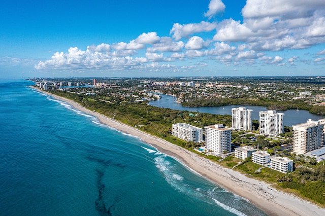 aerial view featuring a view of the beach and a water view