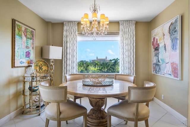 dining space featuring a chandelier and light tile patterned flooring