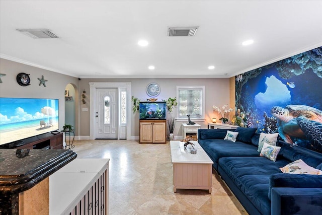 living room with a wealth of natural light and ornamental molding