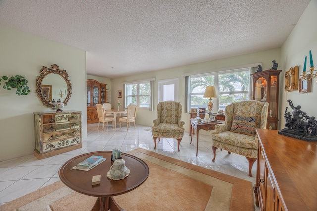 tiled living room with a textured ceiling