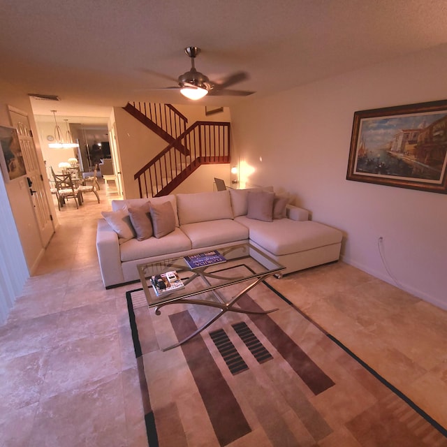 living room featuring ceiling fan