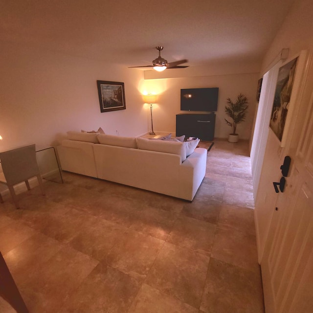 living room featuring ceiling fan