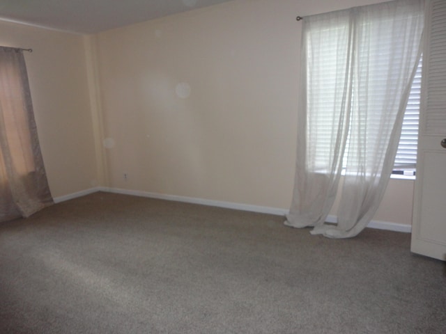 view of carpeted spare room