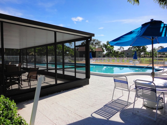 view of swimming pool featuring a patio