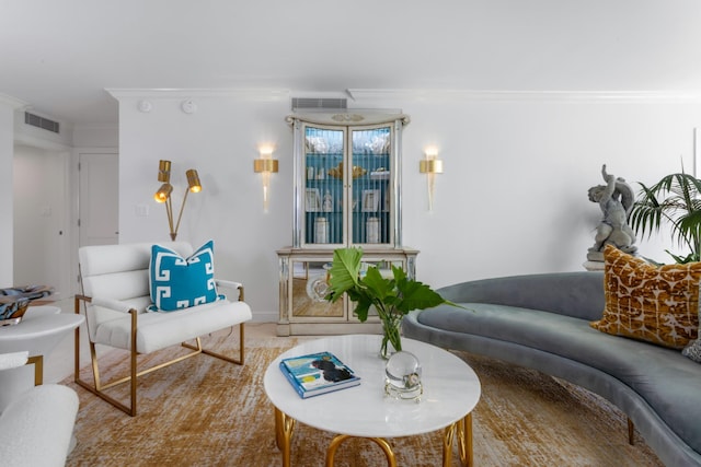 living room featuring crown molding