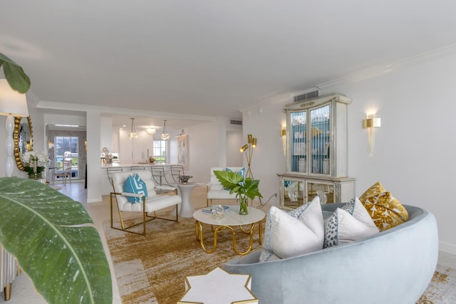 living room with ornamental molding