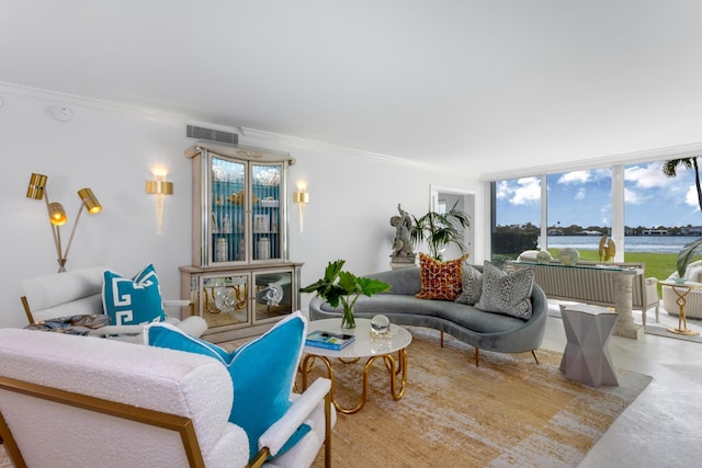 living room with expansive windows and ornamental molding