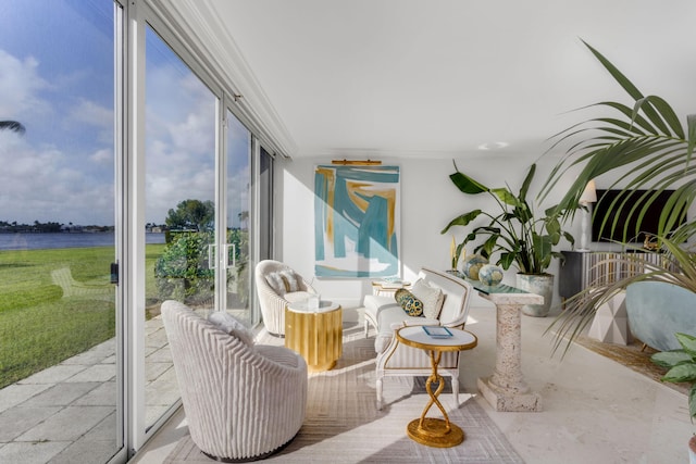 sunroom with a water view