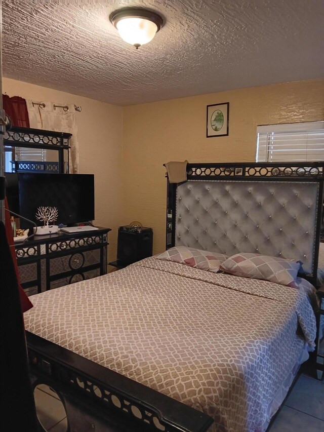 bedroom with a textured ceiling