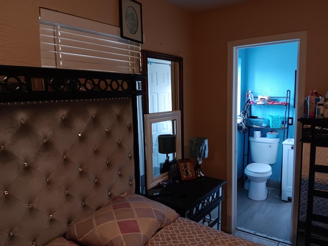 bedroom with connected bathroom