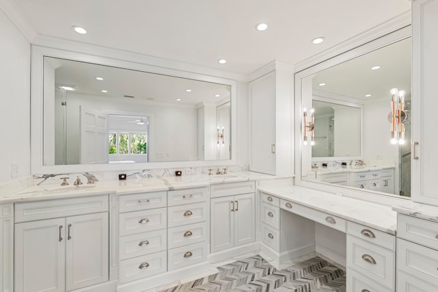 bathroom with vanity, parquet floors, and crown molding