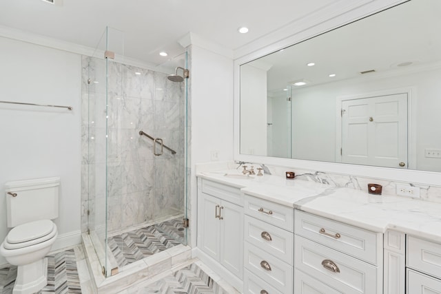 bathroom with a shower with shower door, toilet, ornamental molding, and vanity