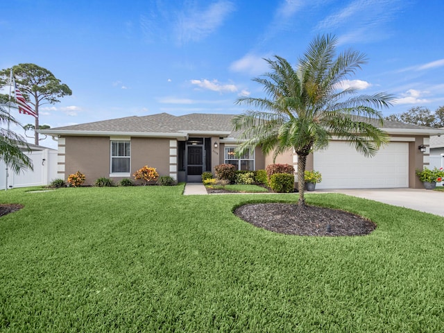 ranch-style home featuring a garage and a front lawn