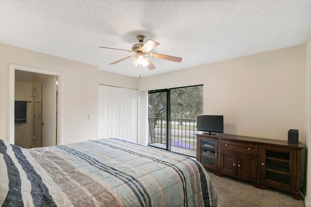 carpeted bedroom with a textured ceiling, a closet, access to outside, and ceiling fan