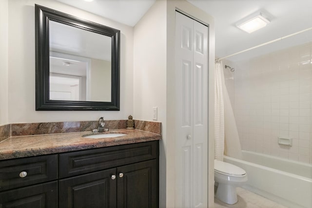 full bathroom with vanity, toilet, and shower / tub combo with curtain