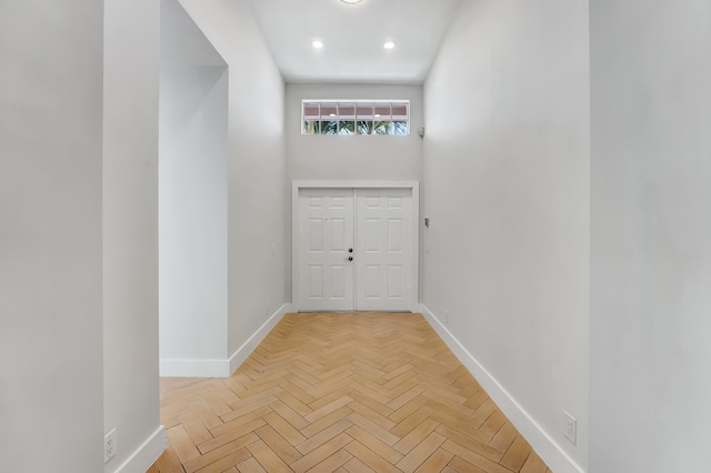 corridor with light parquet flooring