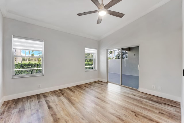 unfurnished room featuring ornamental molding, light hardwood / wood-style floors, lofted ceiling, and ceiling fan