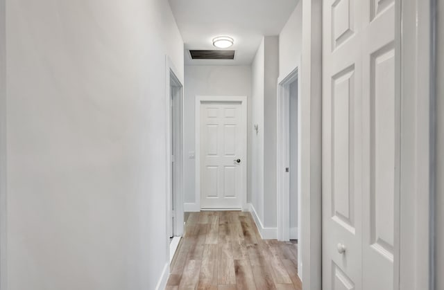 corridor featuring light wood-type flooring