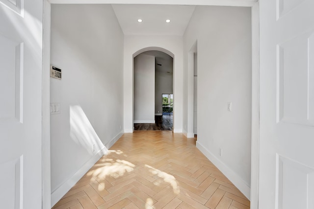 corridor featuring light parquet floors