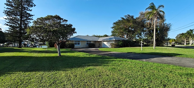 view of front of house with a front lawn