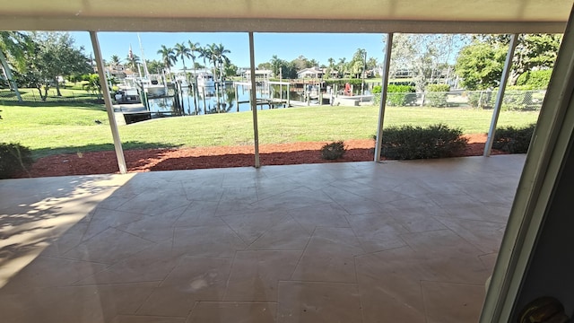 doorway featuring a water view and a wealth of natural light