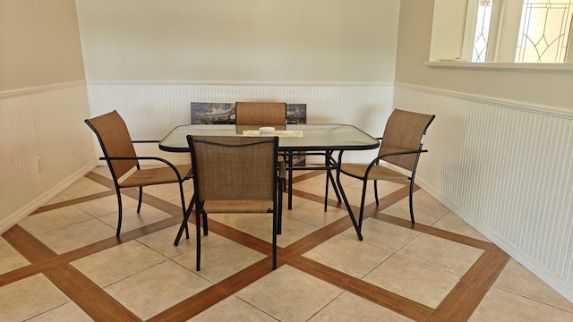 dining space with light tile patterned flooring