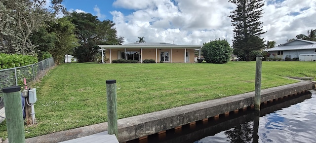 view of front of home with a front lawn