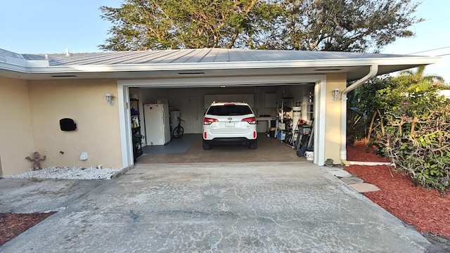 garage featuring white refrigerator