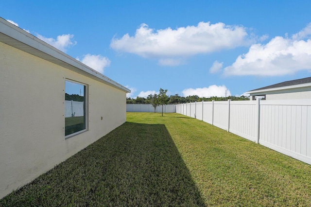 view of yard featuring a fenced backyard