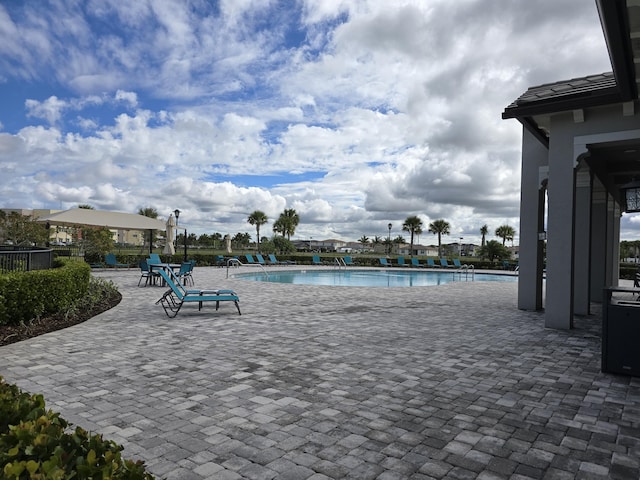 community pool featuring a patio