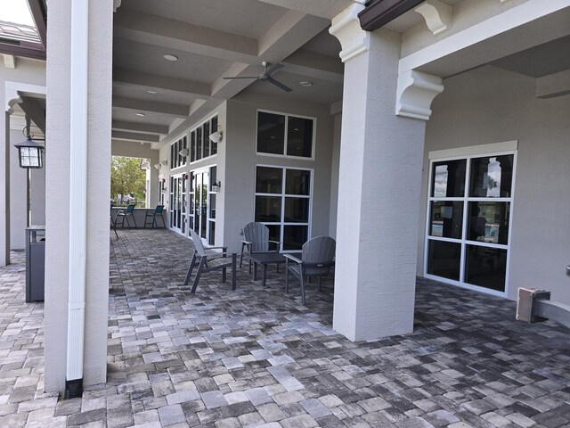 view of patio with ceiling fan
