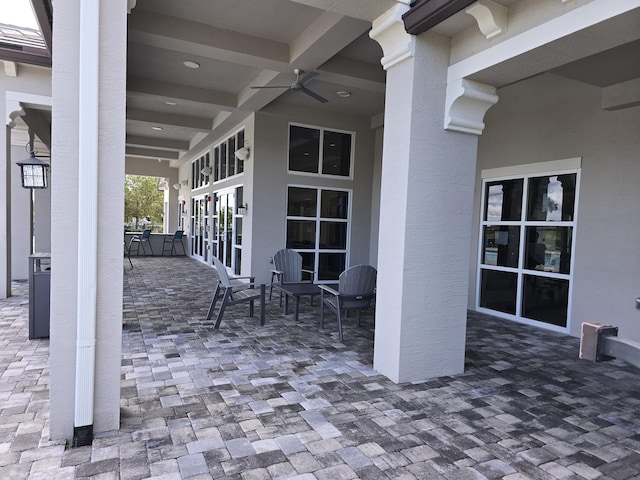 view of patio / terrace with ceiling fan and french doors