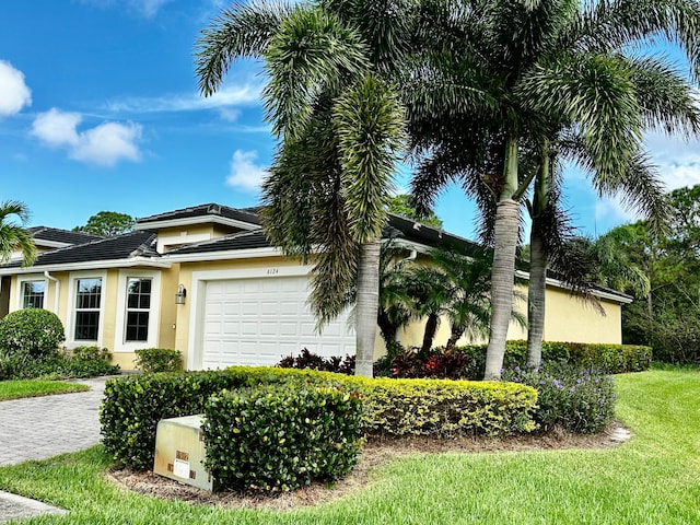 view of front of home with a garage