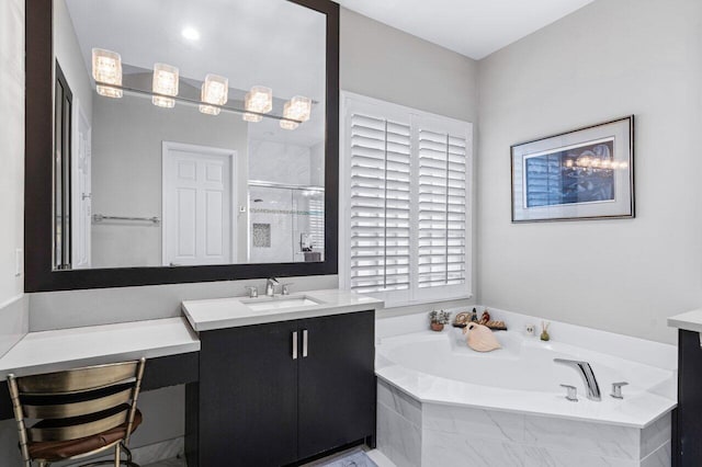 bathroom with independent shower and bath and vanity