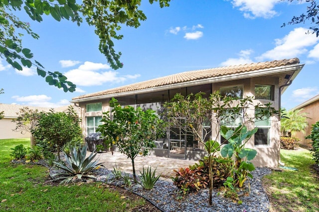 rear view of property with a patio