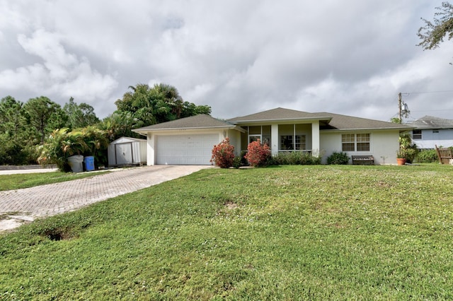 ranch-style home with a front yard and a garage