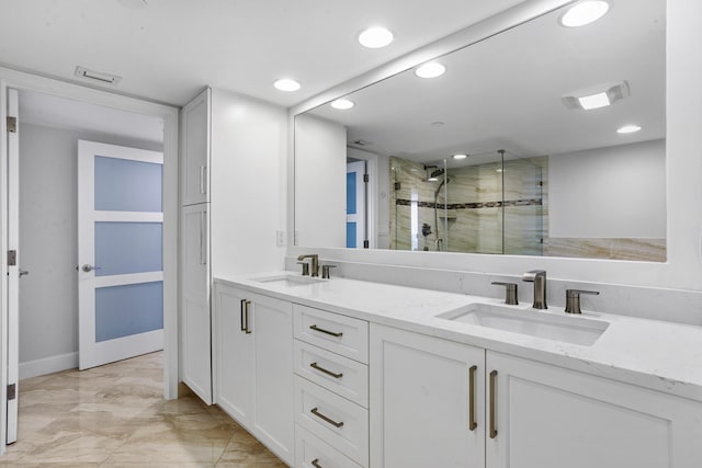 bathroom with vanity and walk in shower