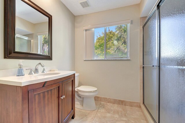 bathroom featuring vanity and a textured ceiling